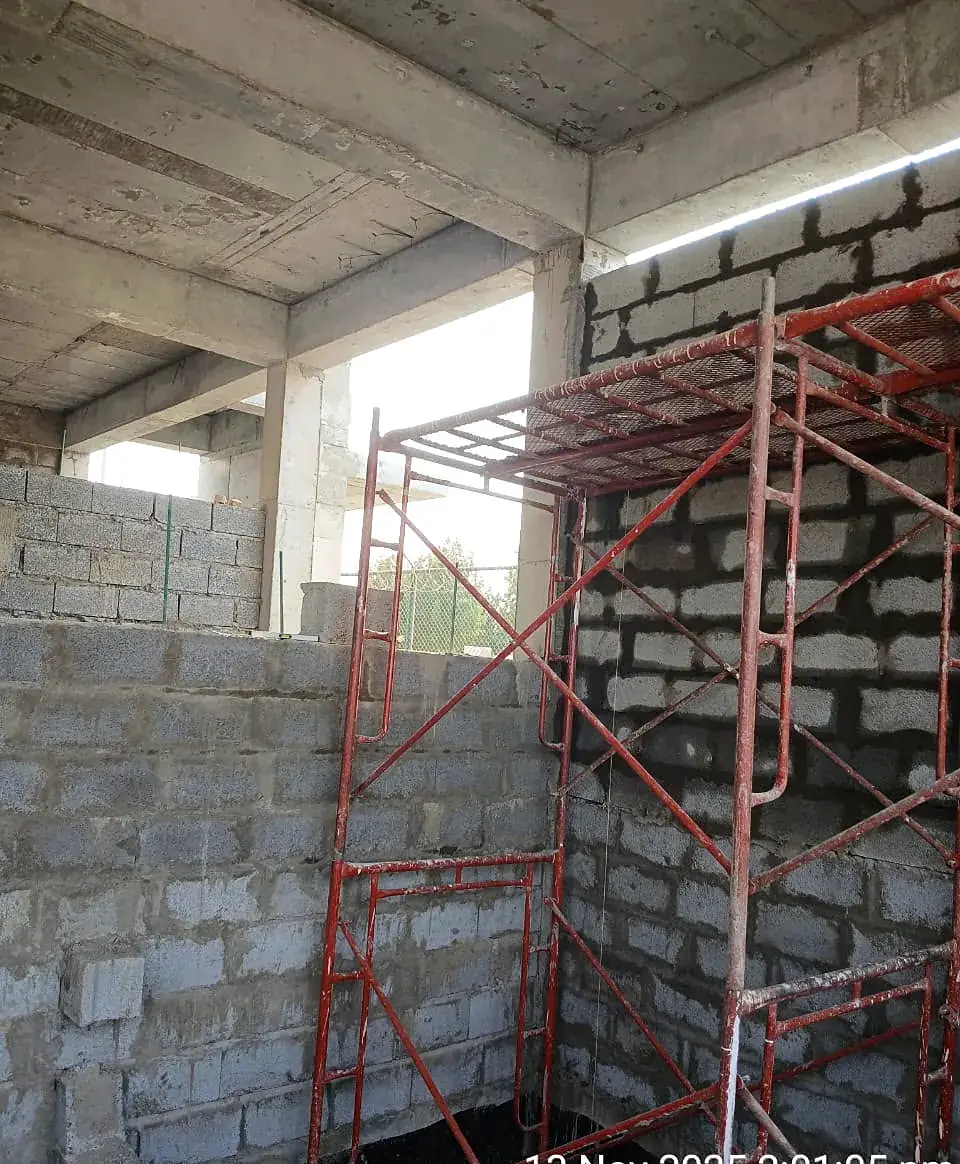 Blockwork and scaffolding inside a new building
