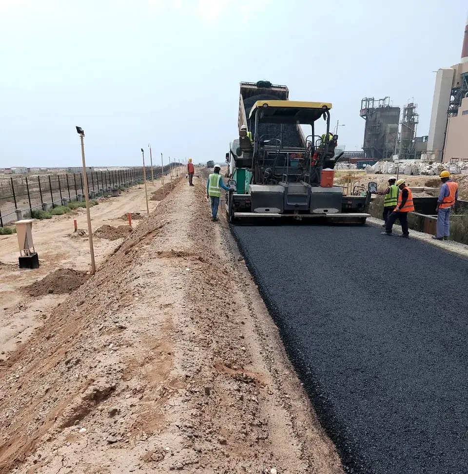 Paving crew and compaction along the boundary