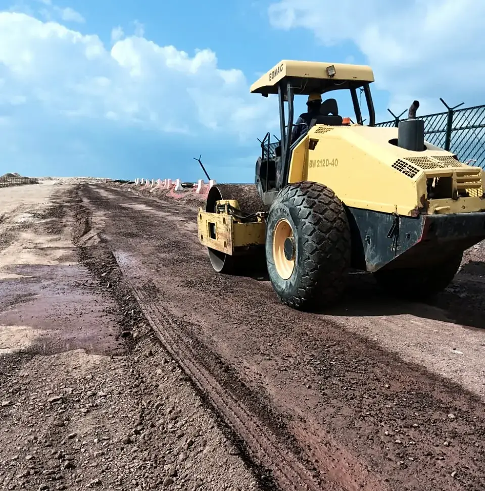 Roller working the sub-base layer