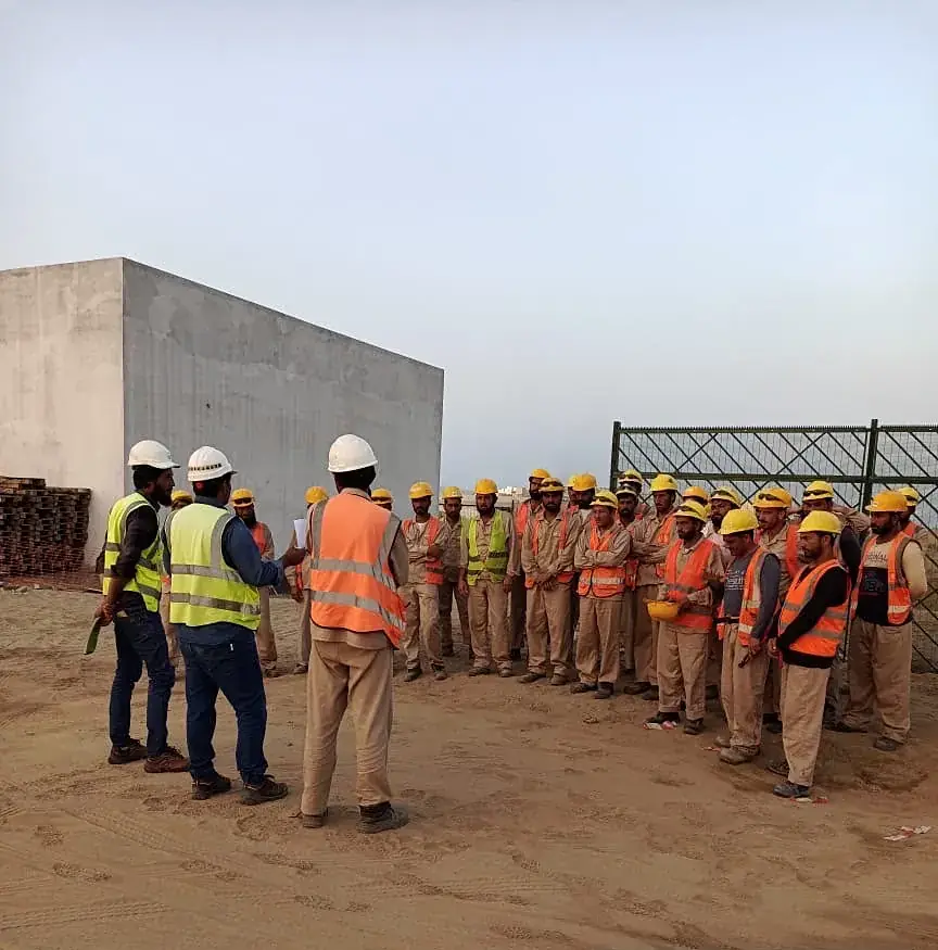 Morning toolbox talk with the site crew